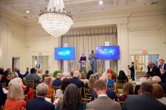 Co-Chairs-TC-Alexander-and-Debbie-Dennis-welcome-guests-during-the-stage-programming