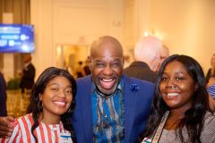 TRAC-Coach-Michael-Guinn-center-with-TRAC-Youth-Annilsa-left-and-Viviahni-right