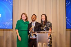 TRAC-Star-Honor-Keon-Hollingshed-center-with-Helen-Carona-and-TRAC-CEO-Nicole-Binkley